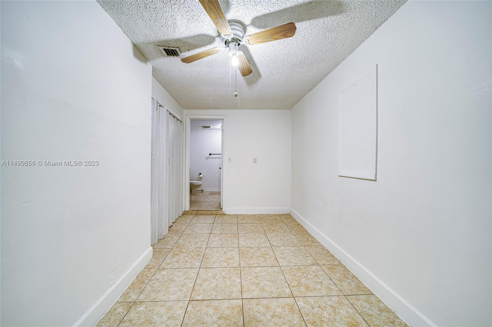 6534 Southwest 34th Street, Unit 2 Miami, FL 33155 - Photo 17 of 20 a view of an empty room