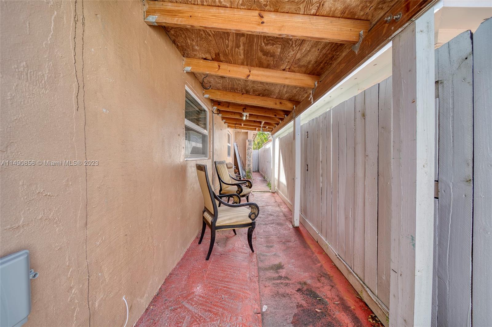 6534 Southwest 34th Street, Unit 2 Miami, FL 33155 - Photo 20 of 20 a view of a hallway with wooden floor and stairs