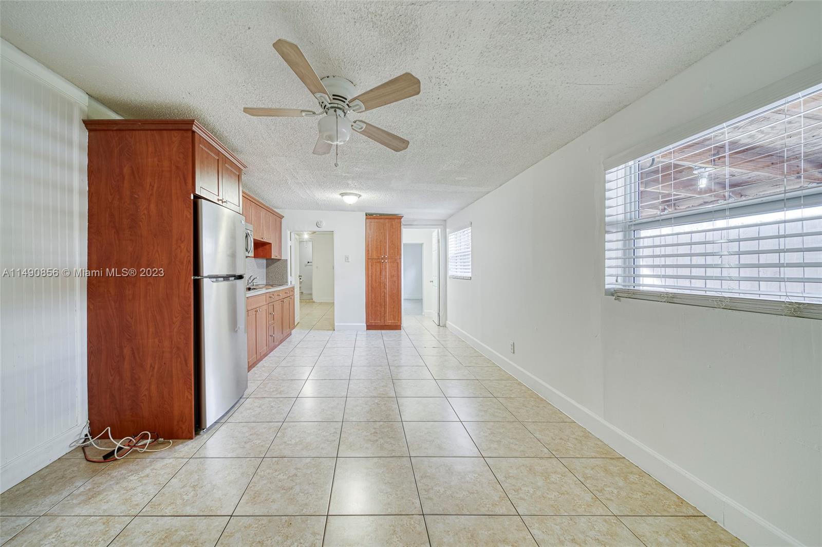 6534 Southwest 34th Street, Unit 2 Miami, FL 33155 - Photo 8 of 20 a view of a kitchen with a sink and cabinet area
