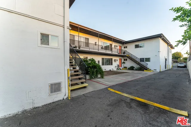 a view of a house with a street