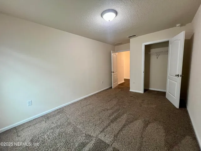 an empty room with a natural light