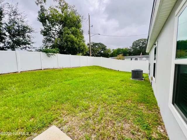 a view of an outdoor space and a yard