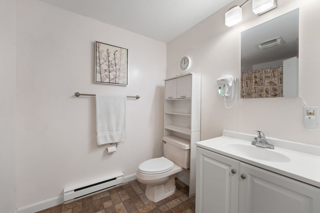 150 Webster Avenue, Unit 3 Chelsea, MA 02150 - Photo 24 of 36 a bathroom with a toilet sink and shower