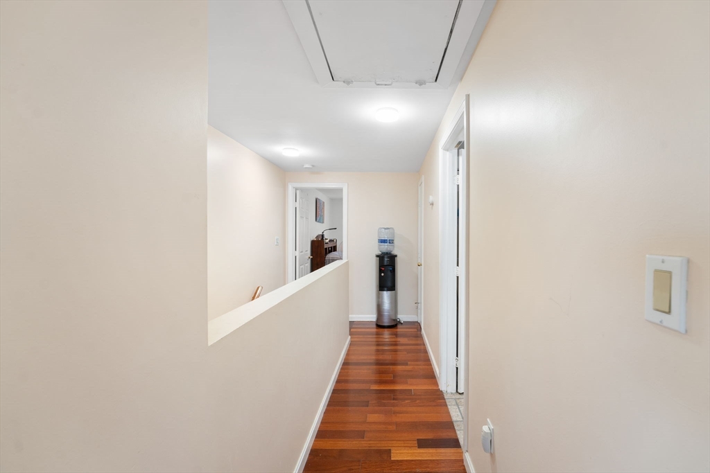 150 Webster Avenue, Unit 3 Chelsea, MA 02150 - Photo 25 of 36 a view of a hallway with wooden floor