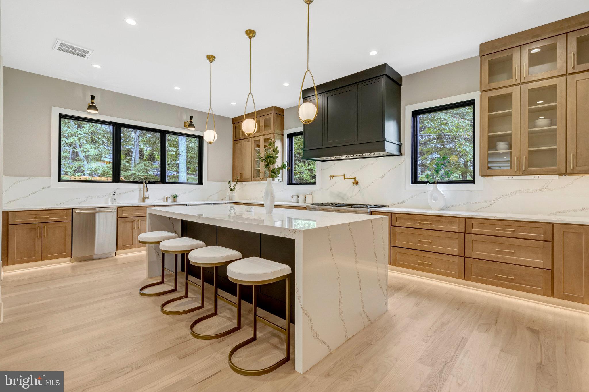 7400 Churchill Road McLean, VA 22101 - Photo 30 of 119 Quartz stone countertops w/ stainless steel sink