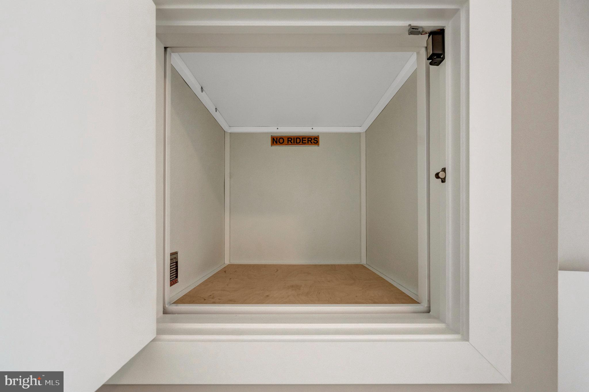 7400 Churchill Road McLean, VA 22101 - Photo 4 of 119 Dumbwaiter from the garage to the main level