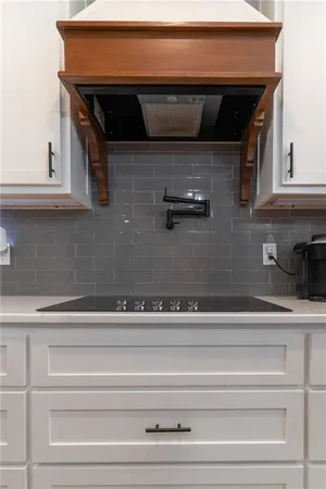 a room with table and a large window