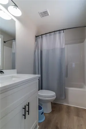 a front view of a house with a garage