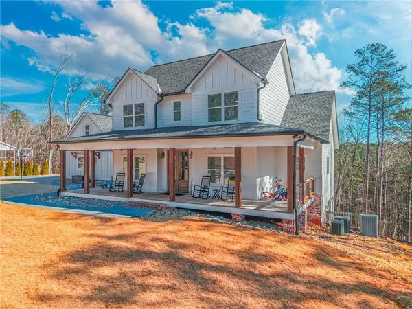 a view of front door with wooden floor