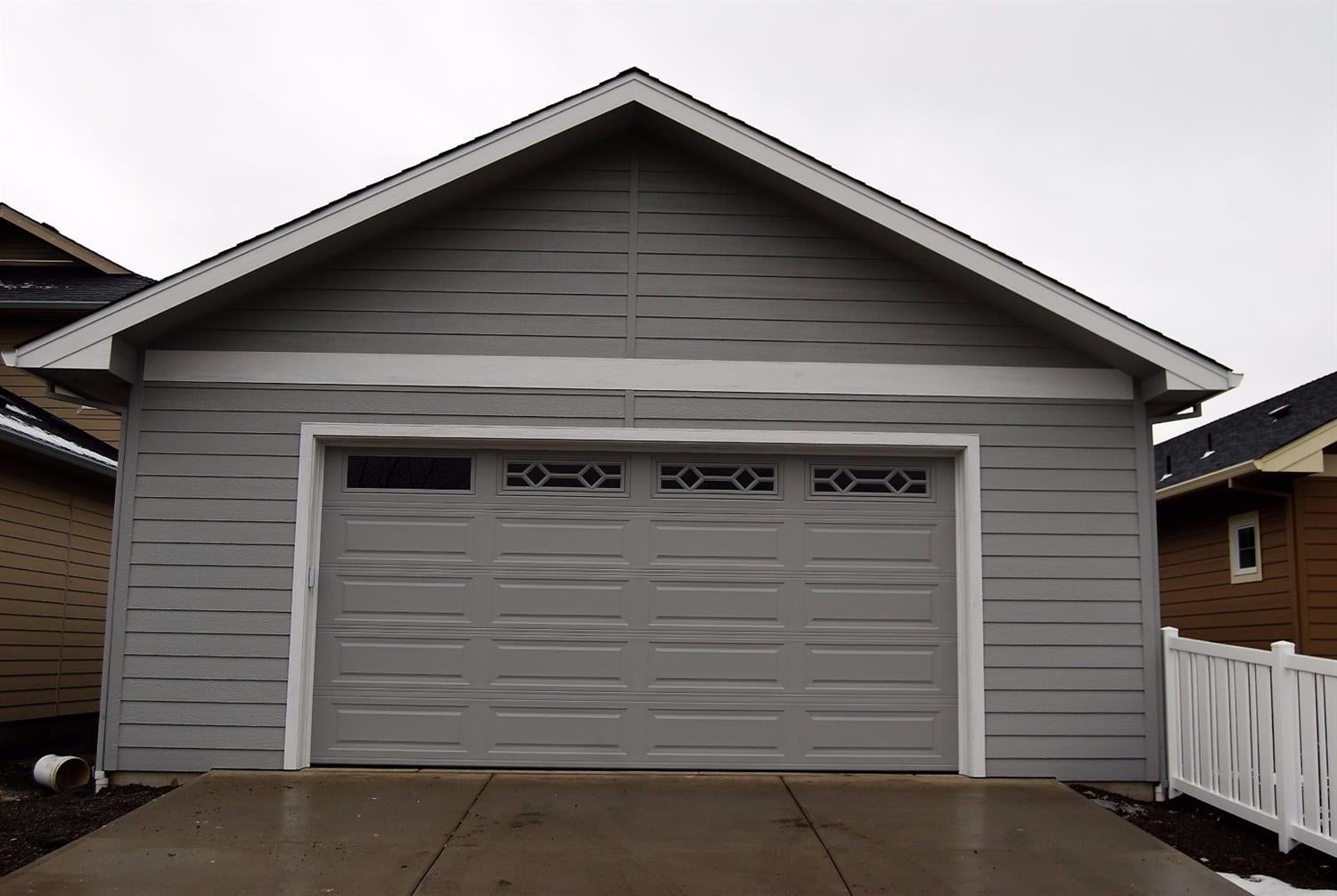 1096 Boulder Ridge Street Central Point, OR 97502 - Photo 2 of 24 Rear view of home, note ex-wide garage!