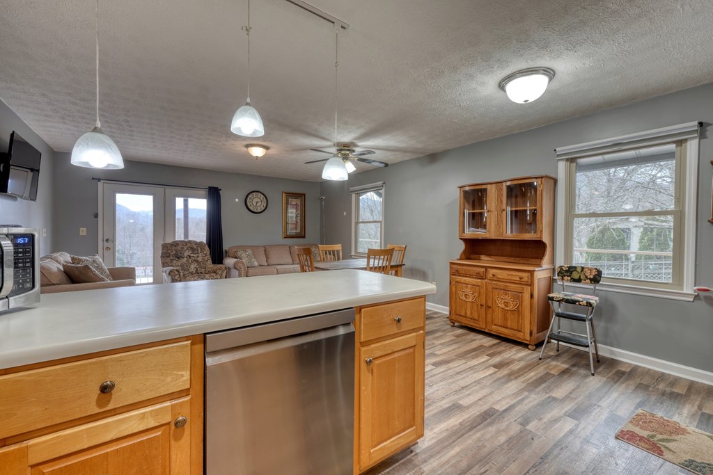 2276 Lovingood Road Hiawassee, GA 30546 - Photo 15 of 54 a kitchen with counter top space and wooden floor