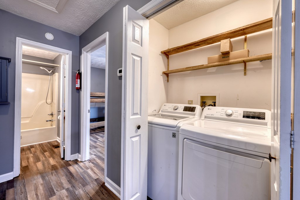 2276 Lovingood Road Hiawassee, GA 30546 - Photo 17 of 54 a view of walk in closet with clothes and shoes