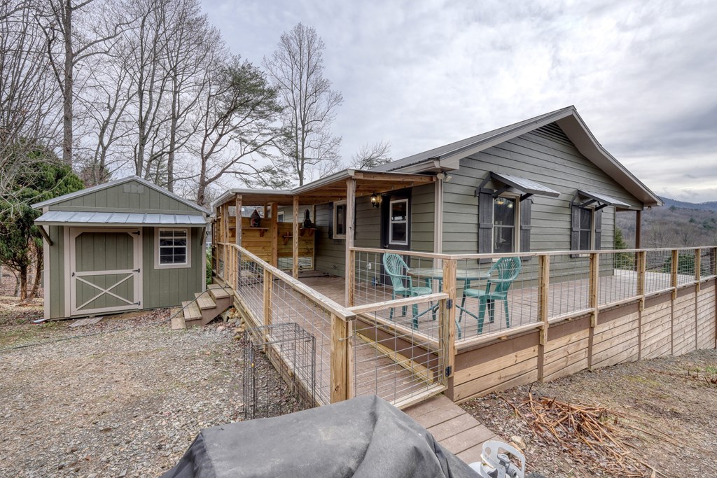 2276 Lovingood Road Hiawassee, GA 30546 - Photo 6 of 54 a view of a house with a yard
