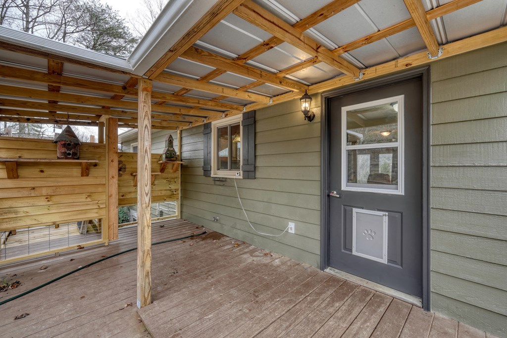 2276 Lovingood Road Hiawassee, GA 30546 - Photo 7 of 54 a view of a porch of the house