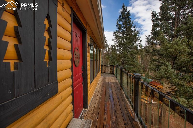 361 Willow Road Divide, CO 80814 - Photo 23 of 28 a view of balcony and wooden floor