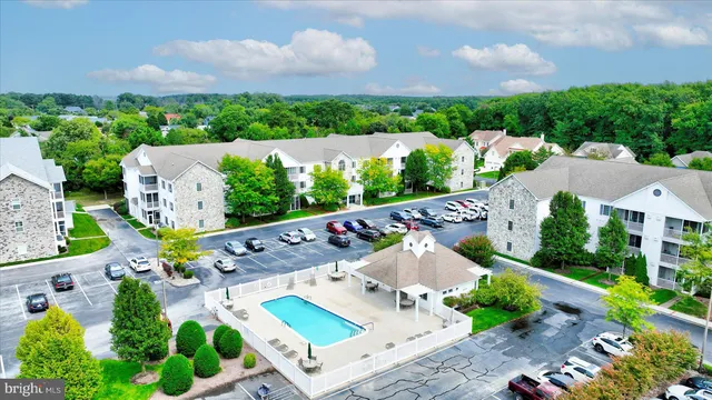 an aerial view of a house with a garden