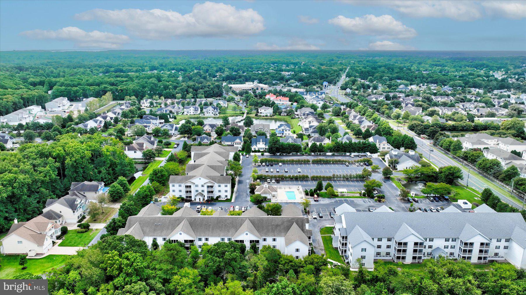 30611 Cedar Neck Road, Unit 2204 Ocean View, DE 19970 - Photo 28 of 33 an aerial view of multiple house