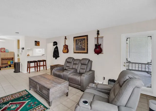 a living room with furniture and a couch