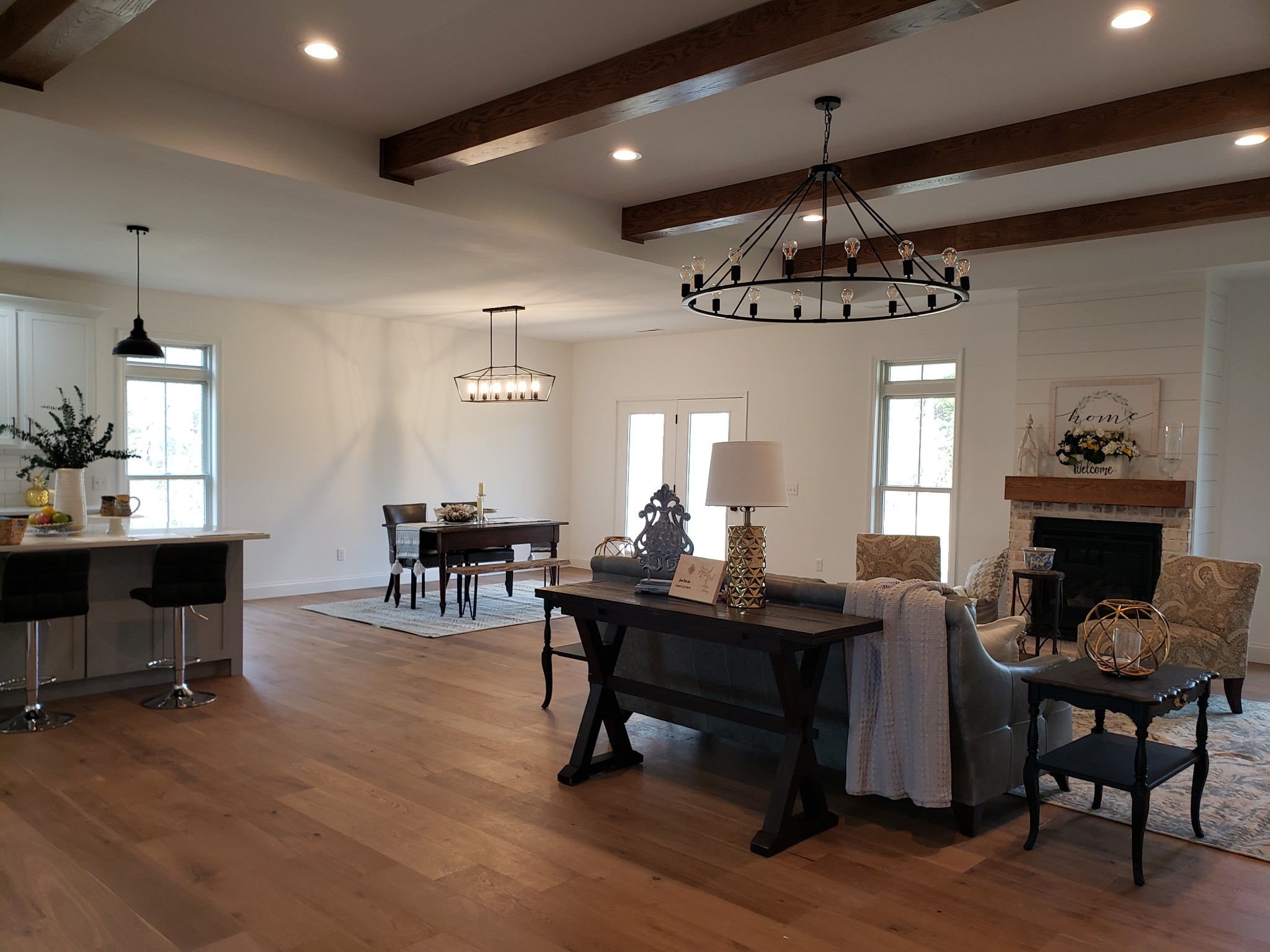 8221 Cookeville Boatdock Road Baxter, TN 38544 - Photo 10 of 13 a view of a dining room with furniture window and wooden floor