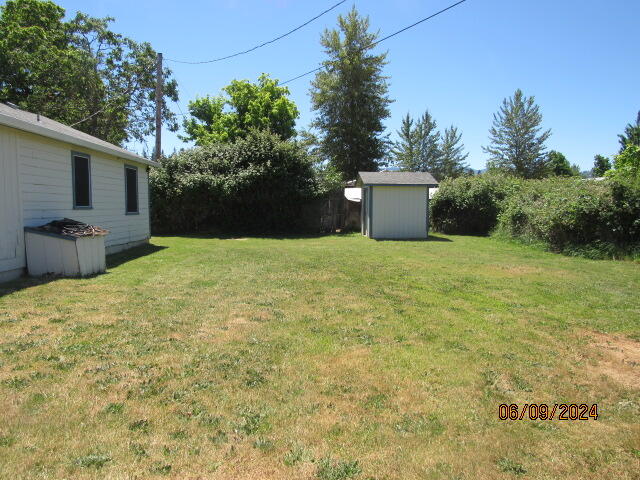 1678 Dowell Road Grants Pass, OR 97527 - Photo 6 of 22 Back of house and shed