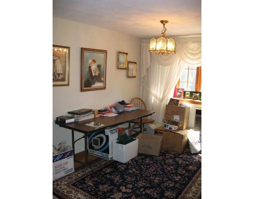 44 Ansie Road Chelmsford, MA 01824 - Photo 11 of 29 a dining room with a table and chairs