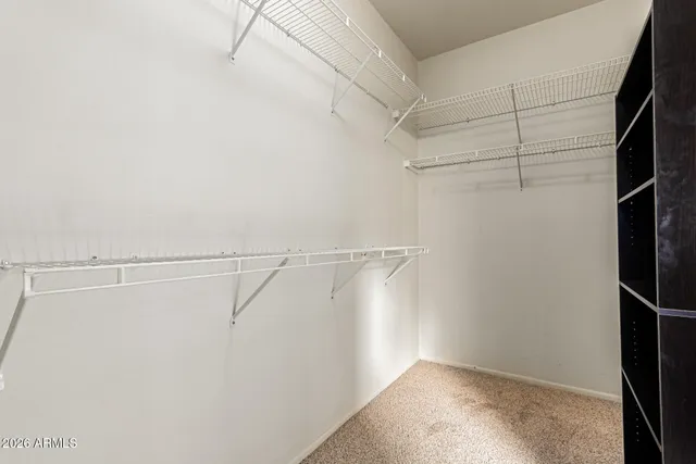 a view of a room with racks on the wall