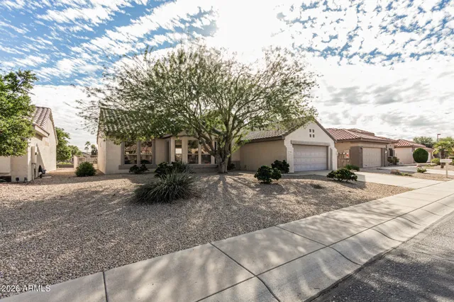 a front view of a house with a patio