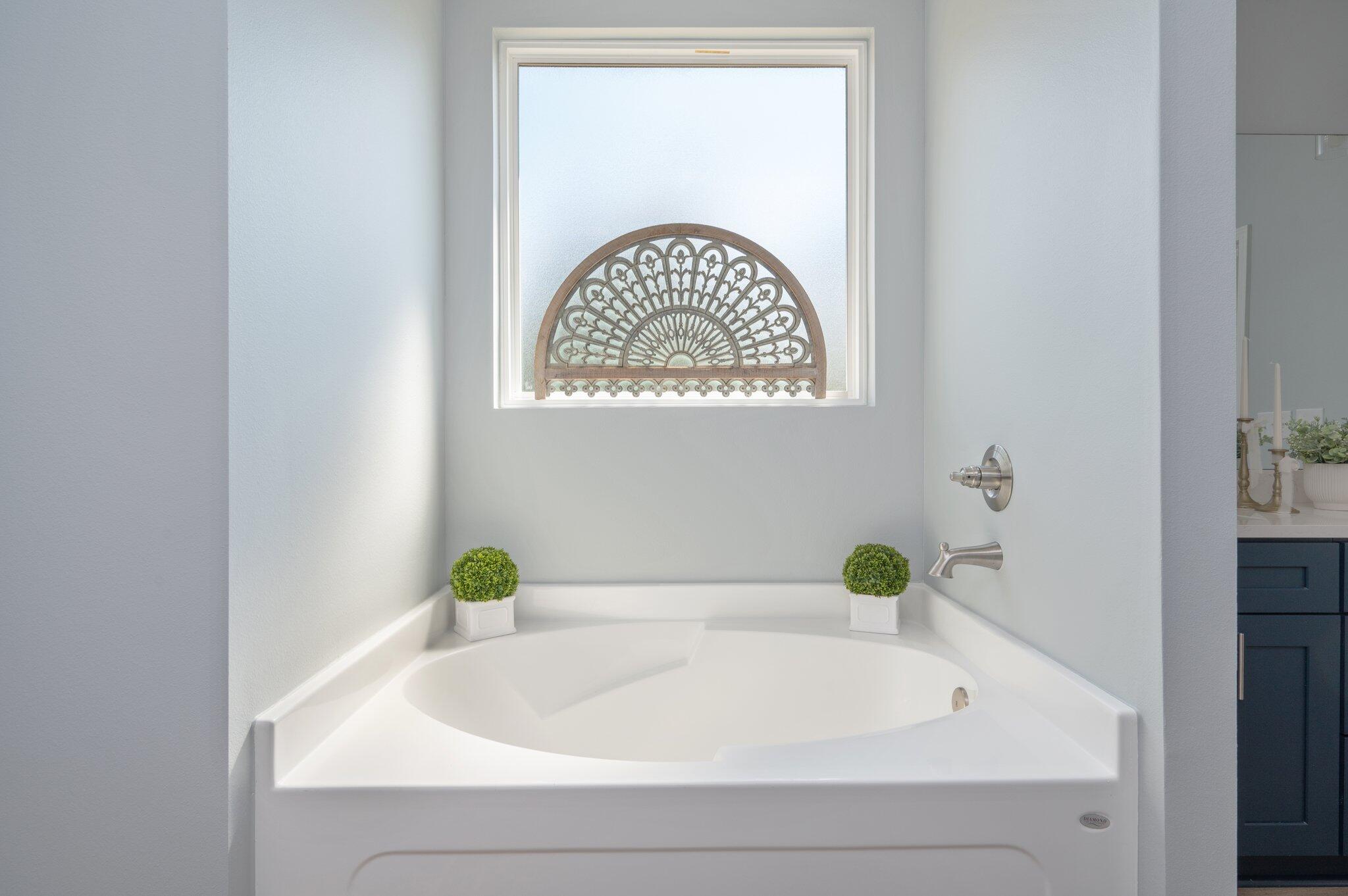 6010 Sand Hill Road Crestview, FL 32539 - Photo 24 of 33 a bathroom with a bathtub