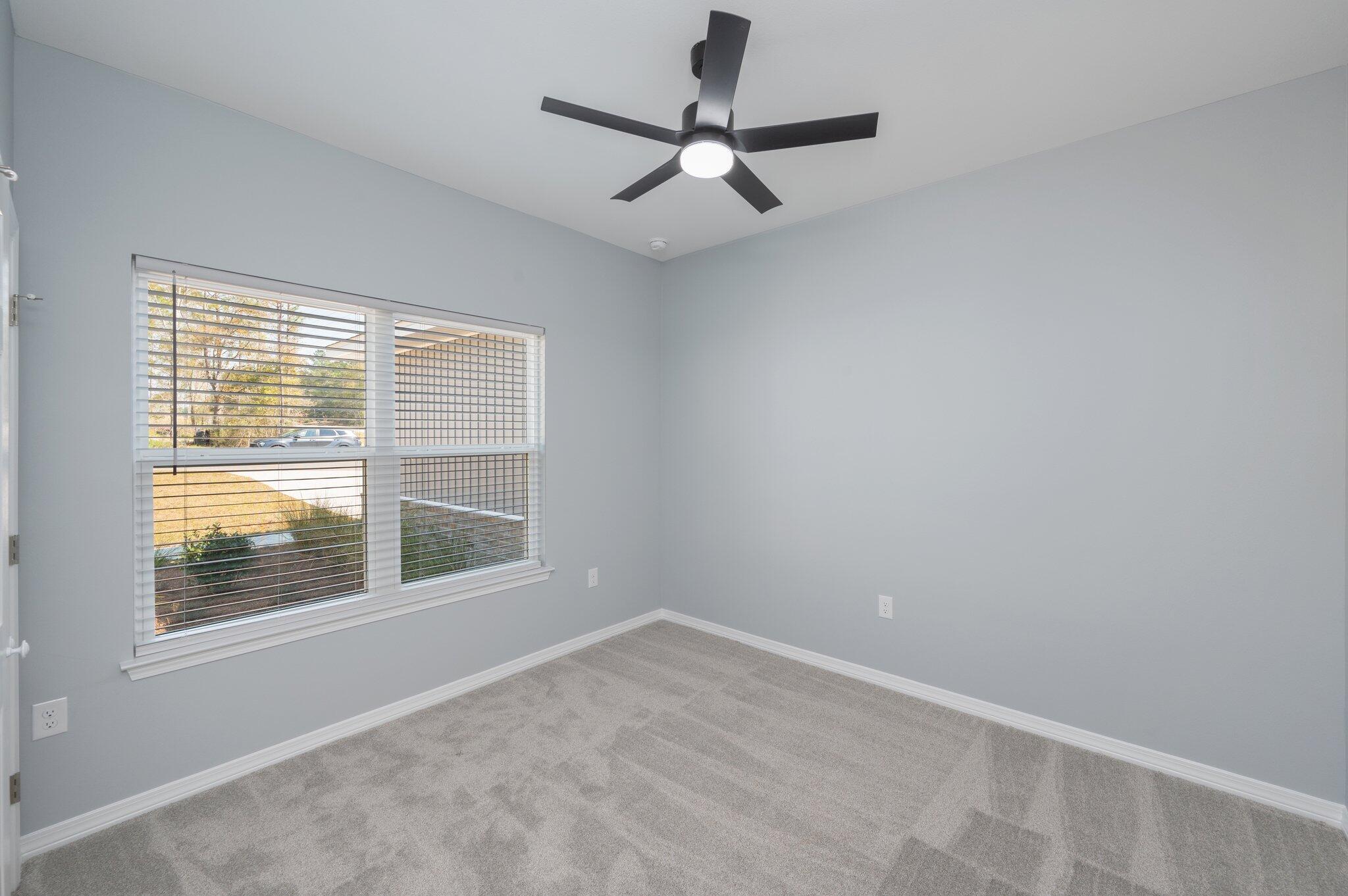 6010 Sand Hill Road Crestview, FL 32539 - Photo 27 of 33 a view of an empty room with a window