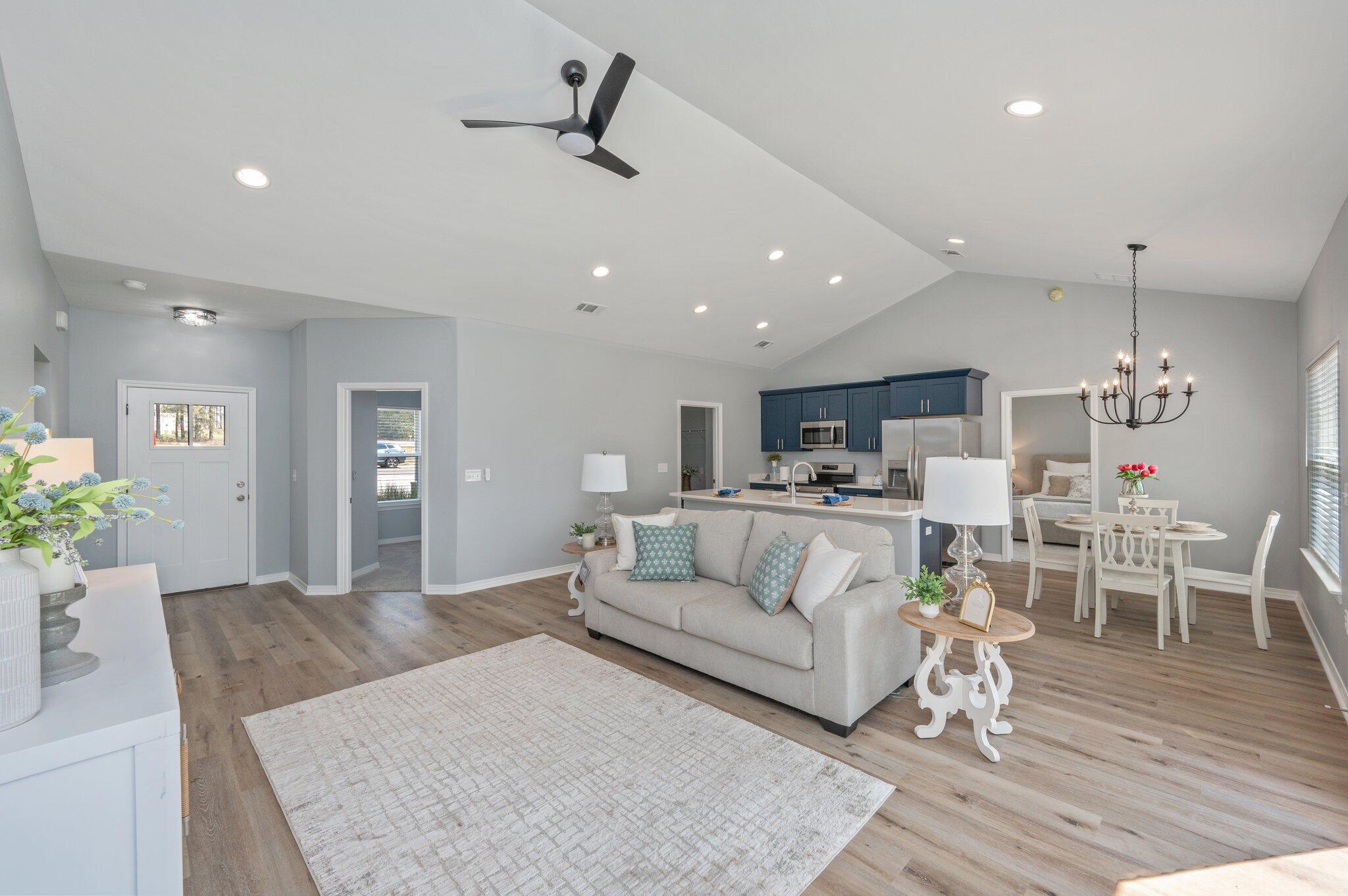 6010 Sand Hill Road Crestview, FL 32539 - Photo 8 of 33 a living room with furniture and a wooden floor
