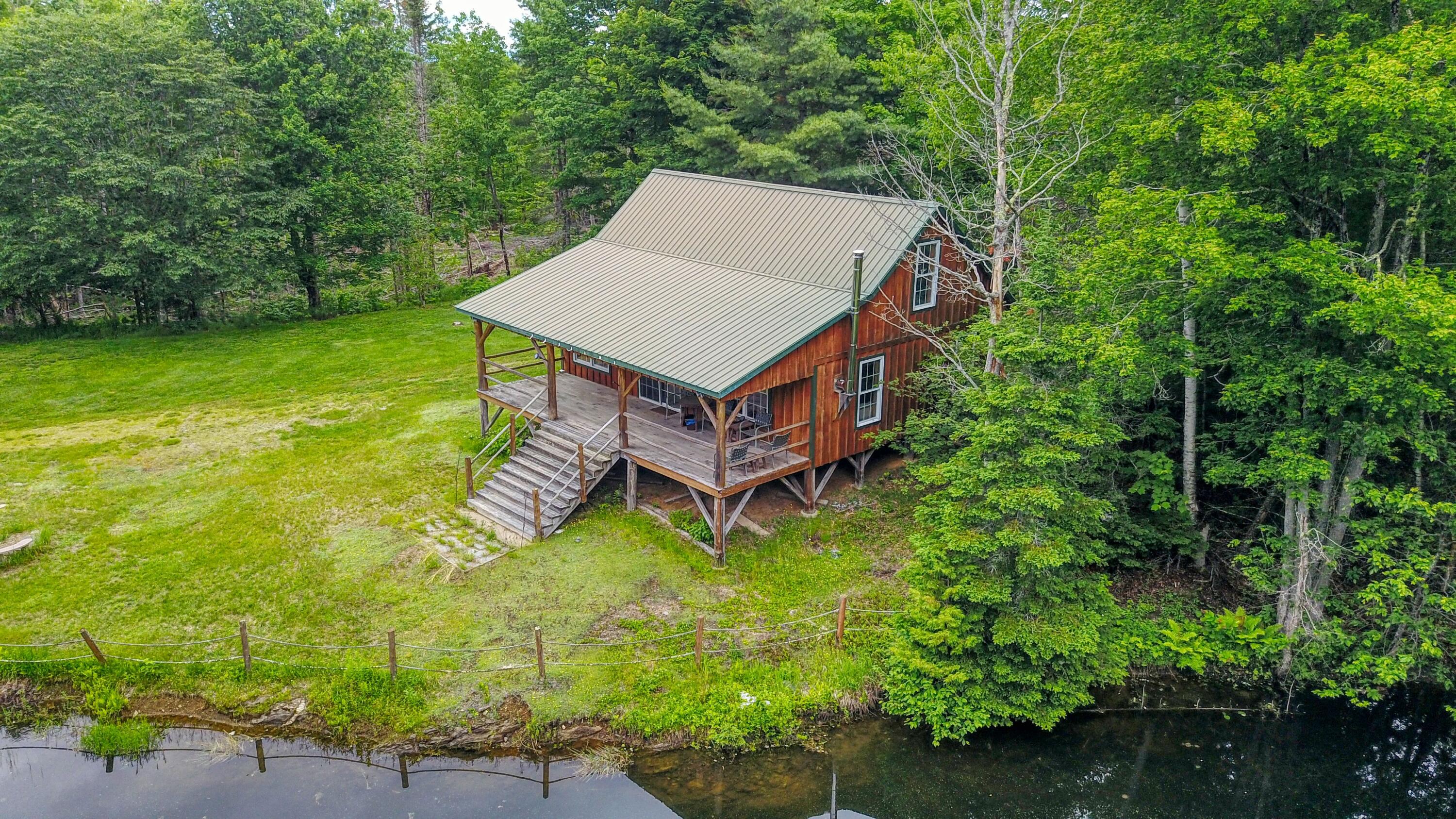 Lot 17 East Thorndike Road Thorndike, ME 04986 - Photo 10 of 31 Right View of Cabin