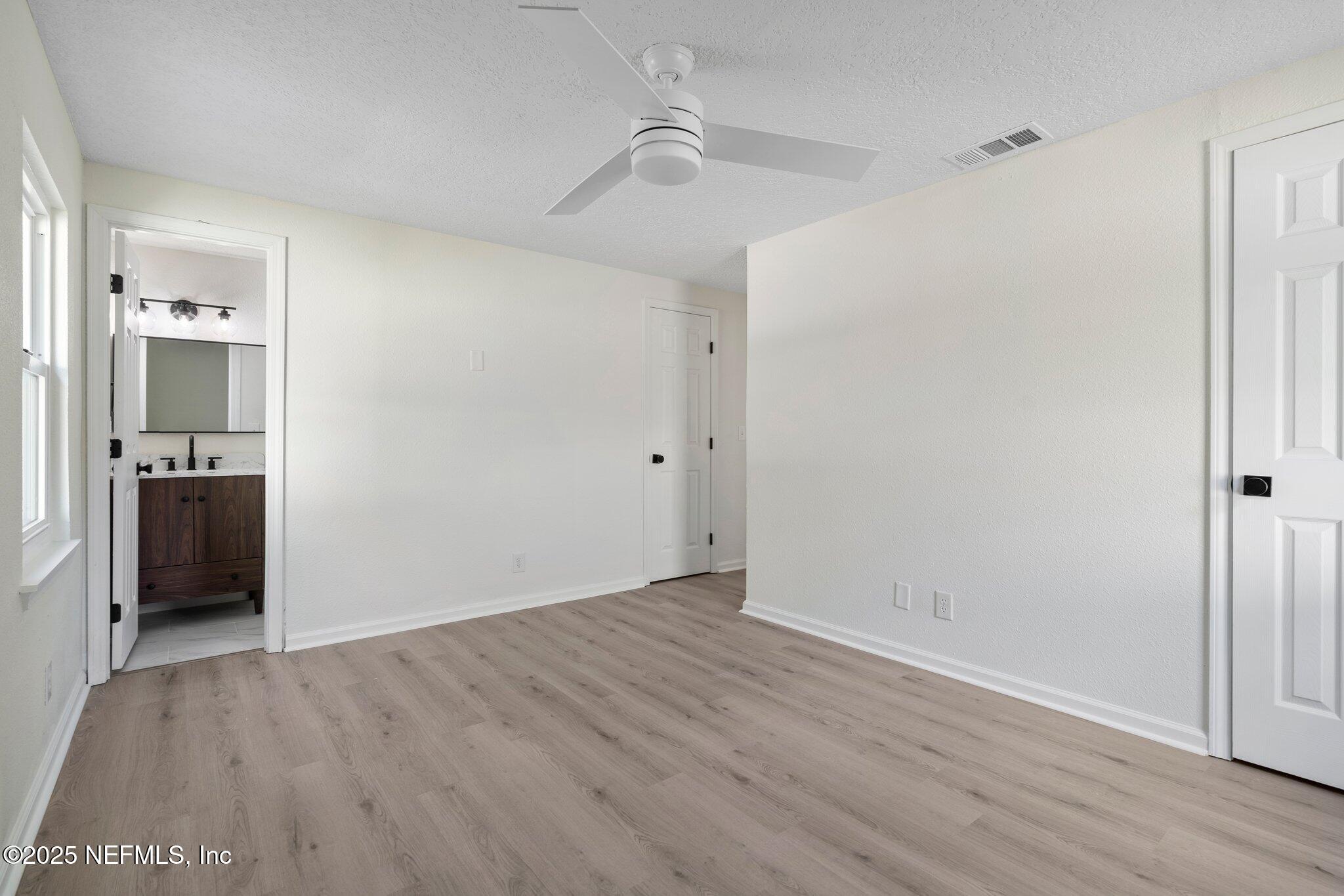 560 Aquarius Concourse Orange Park, FL 32073 - Photo 17 of 32 wooden floor in an empty room