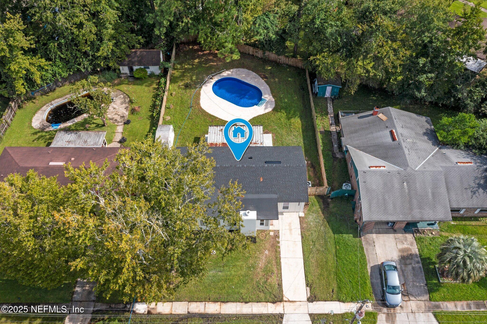 560 Aquarius Concourse Orange Park, FL 32073 - Photo 31 of 32 an aerial view of house with yard swimming pool and outdoor seating