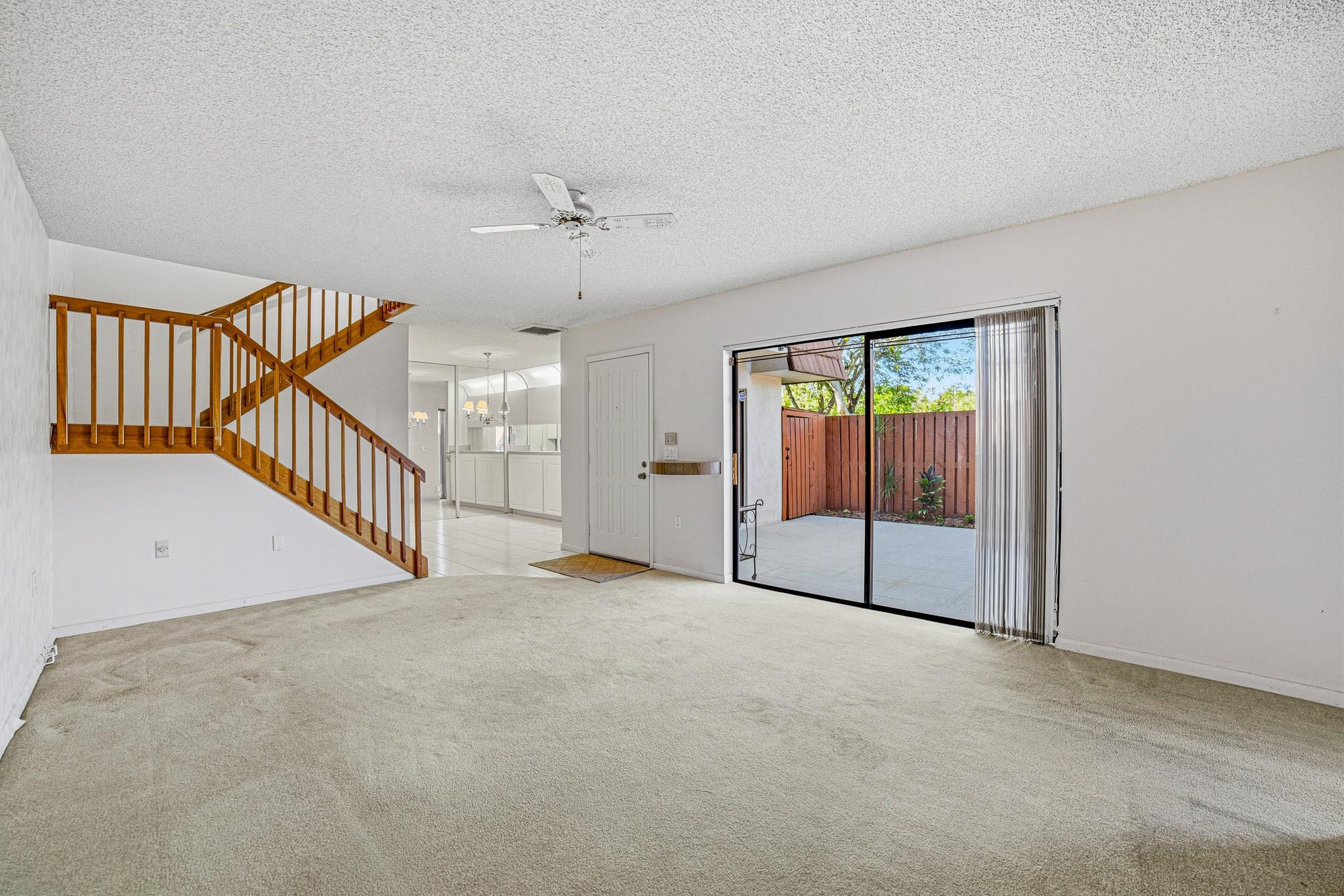 9101 Southwest 19th Place, Unit B Davie, FL 33324 - Photo 12 of 55 a view of an empty room with a window