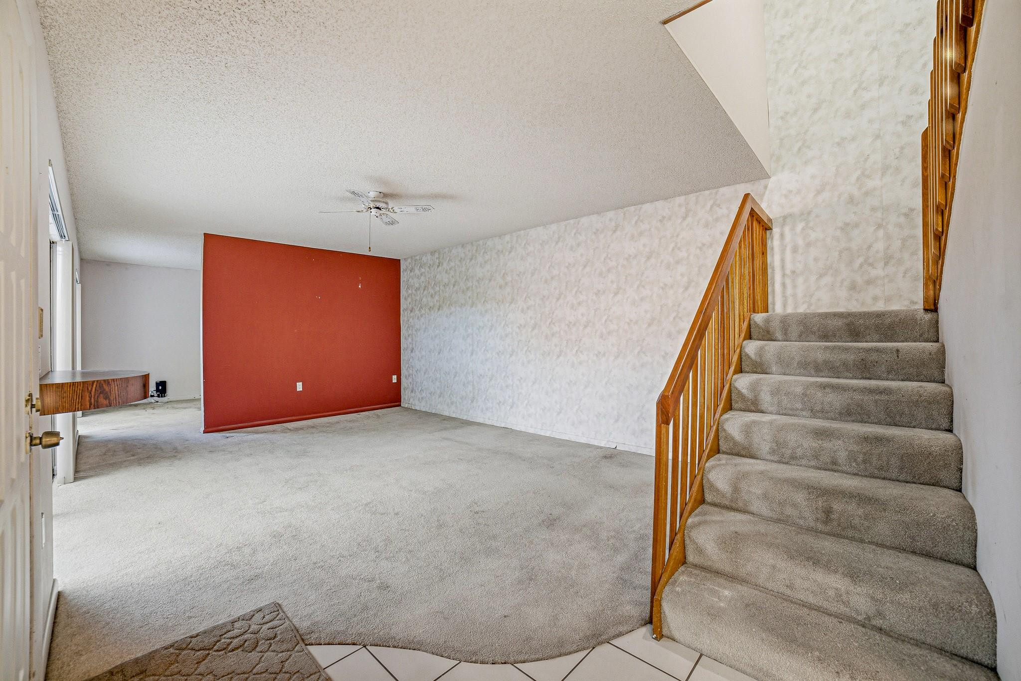 9101 Southwest 19th Place, Unit B Davie, FL 33324 - Photo 13 of 55 a view of an empty room with stairs