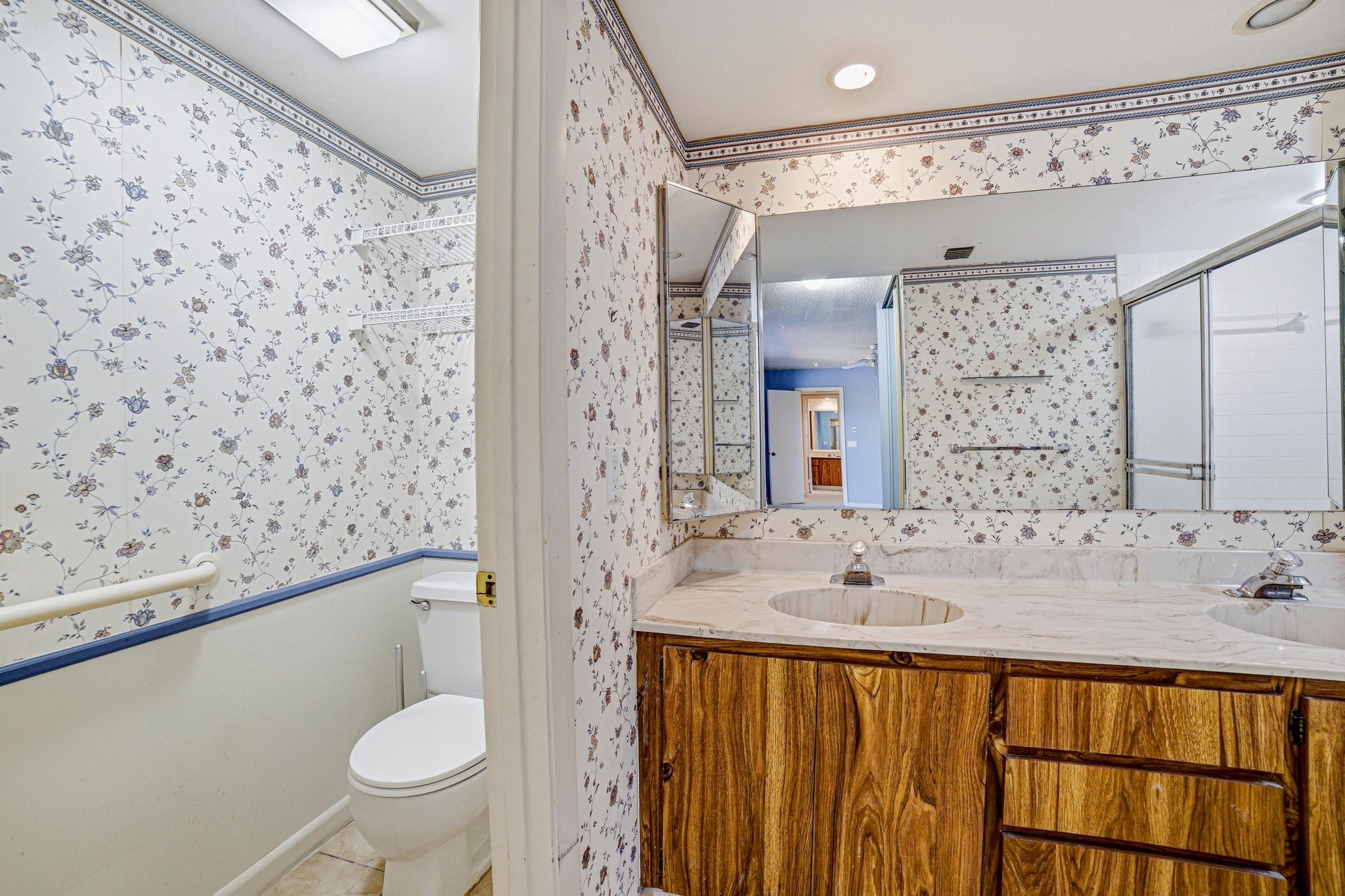 9101 Southwest 19th Place, Unit B Davie, FL 33324 - Photo 23 of 55 a bathroom with a sink and a mirror