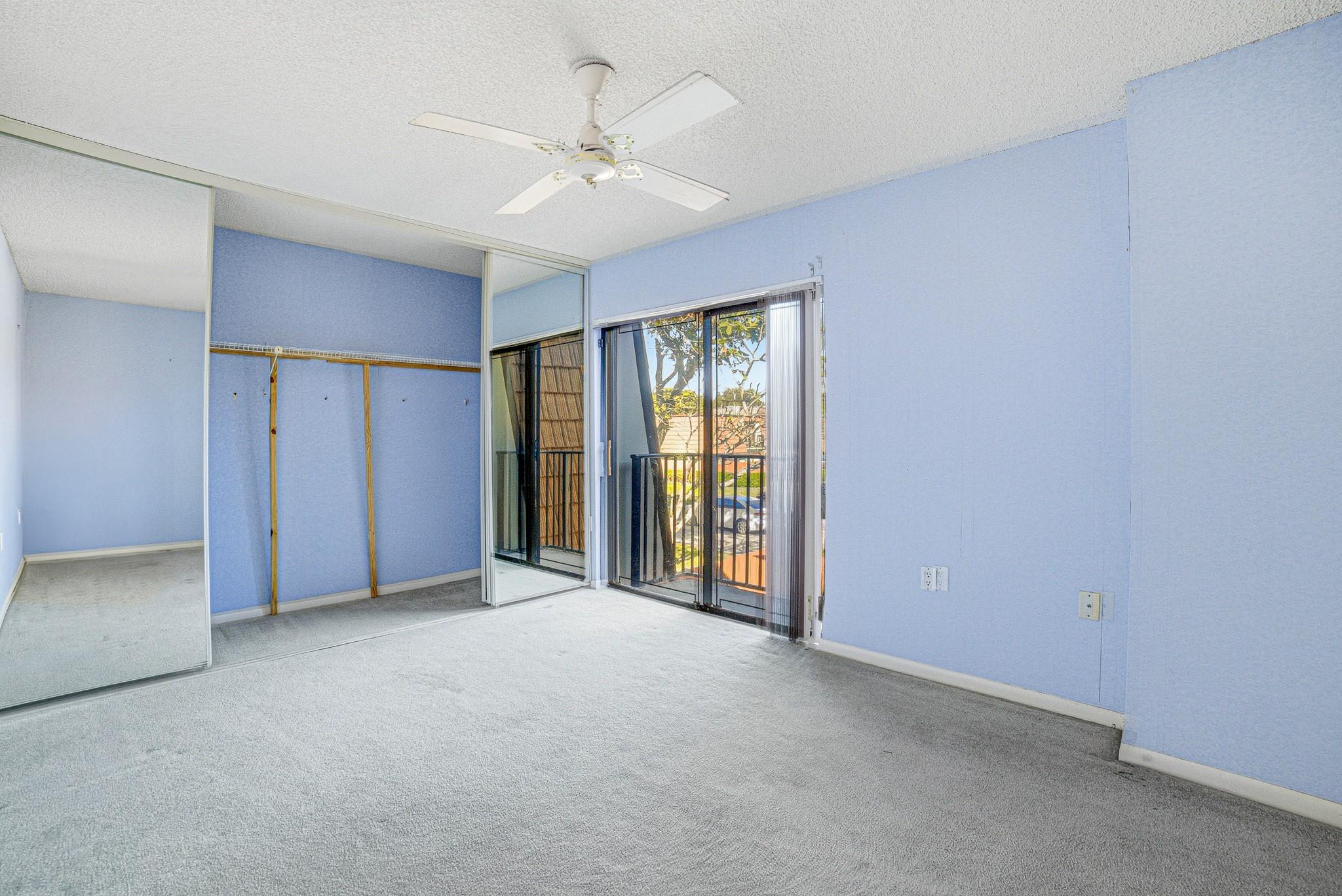 9101 Southwest 19th Place, Unit B Davie, FL 33324 - Photo 28 of 55 a view of an empty room with chandelier fan