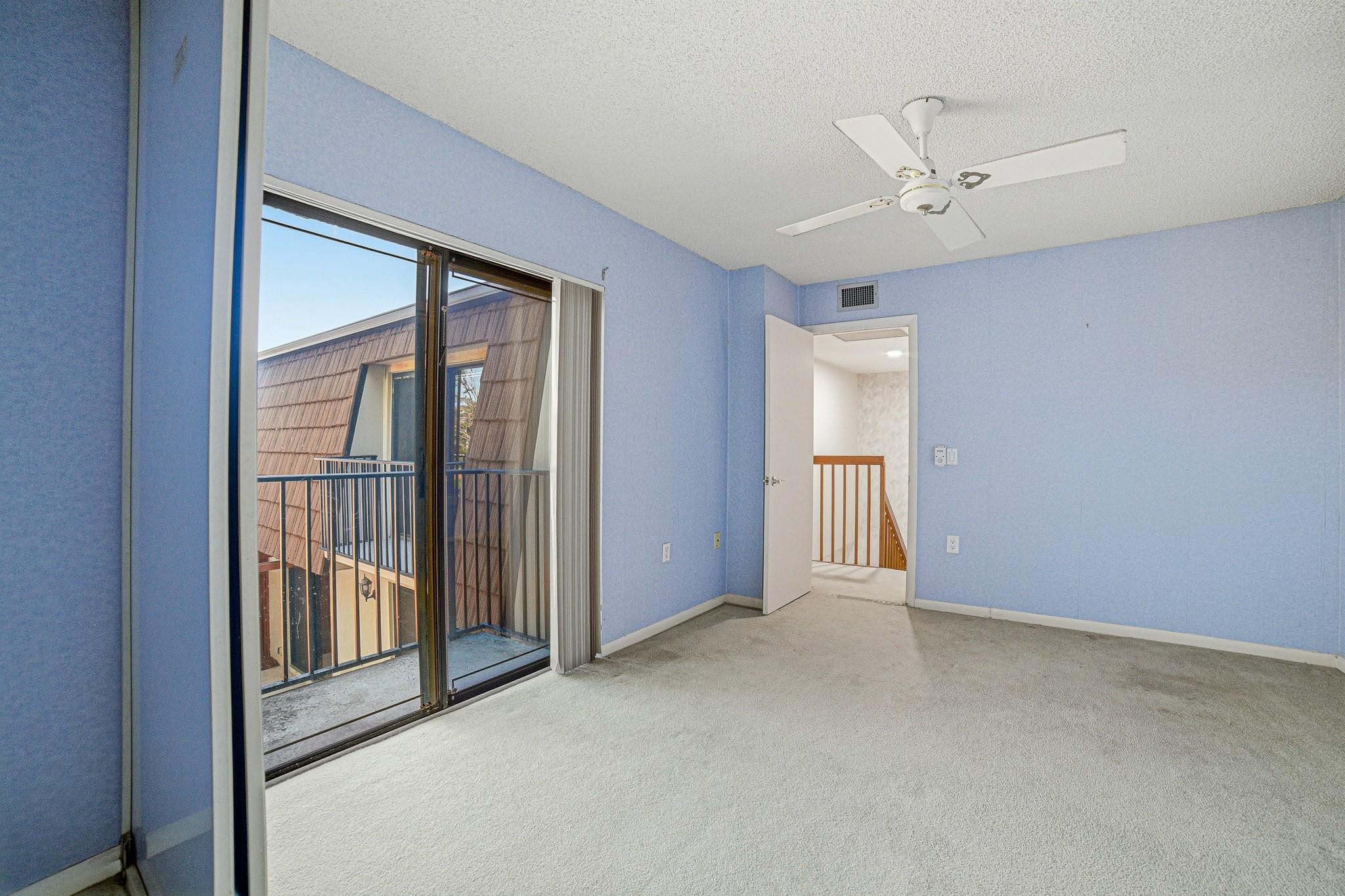 9101 Southwest 19th Place, Unit B Davie, FL 33324 - Photo 29 of 55 a view of an empty room with a window