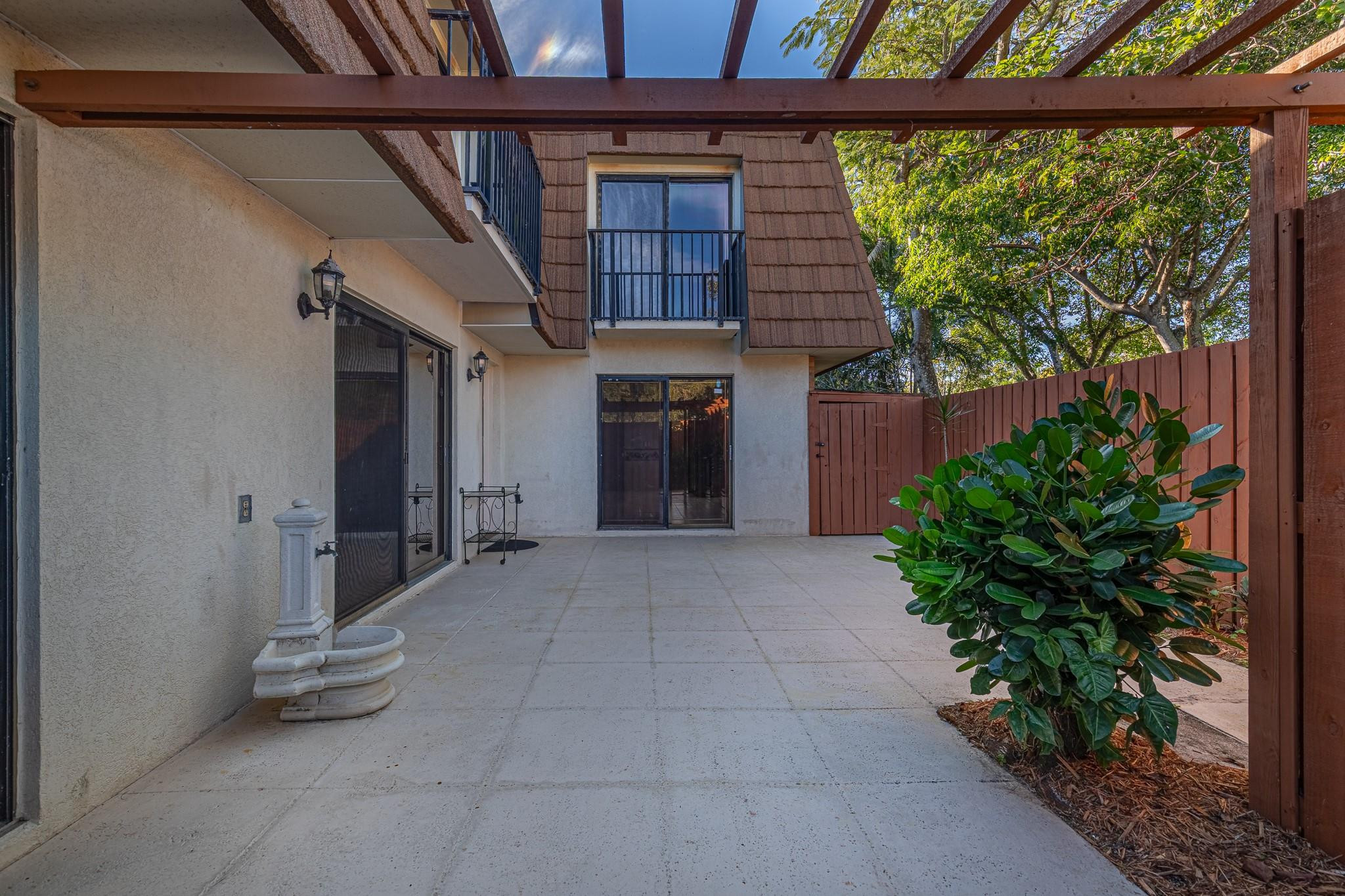 9101 Southwest 19th Place, Unit B Davie, FL 33324 - Photo 4 of 55 a view of entryway with a yard