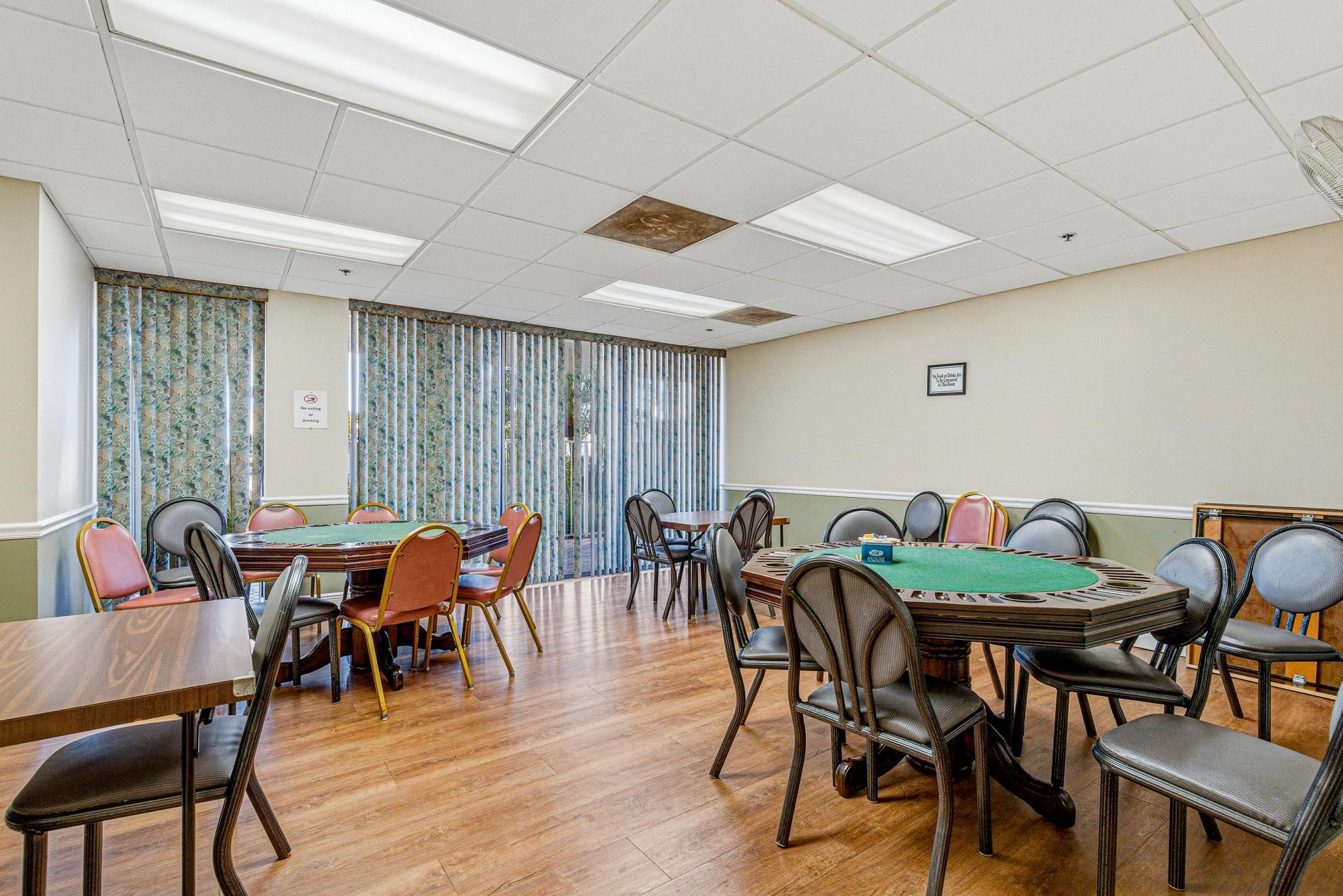 9101 Southwest 19th Place, Unit B Davie, FL 33324 - Photo 47 of 55 a view of a dining room with furniture and wooden floor