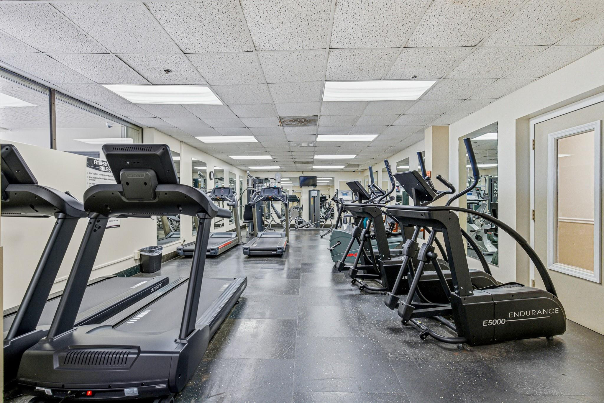 9101 Southwest 19th Place, Unit B Davie, FL 33324 - Photo 48 of 55 a view of a room with gym equipment