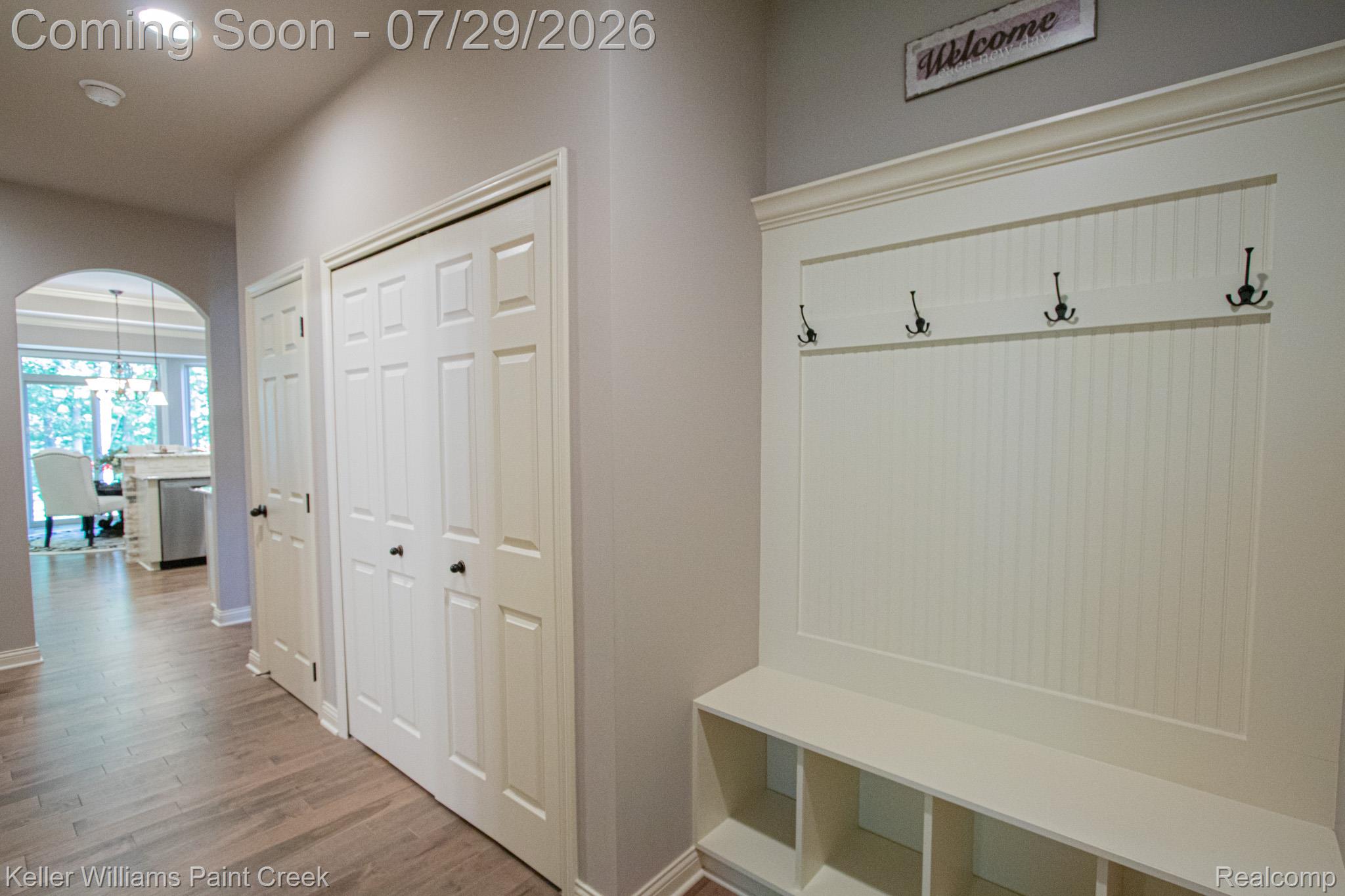 49118 Ridgeview Drive Macomb, MI 48044 - Photo 23 of 57 Entryway with wood-finish flooring, recessed lighting, and a built-in hall tree featuring beadboard paneling, storage cubbies, and coat hooks