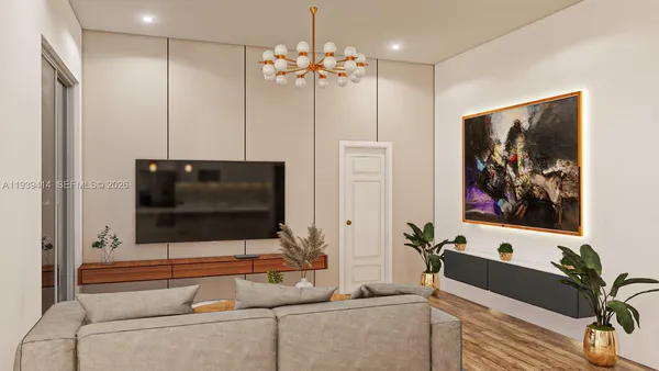 a kitchen with stainless steel appliances kitchen island granite countertop a stove a sink and white cabinets with wooden floor