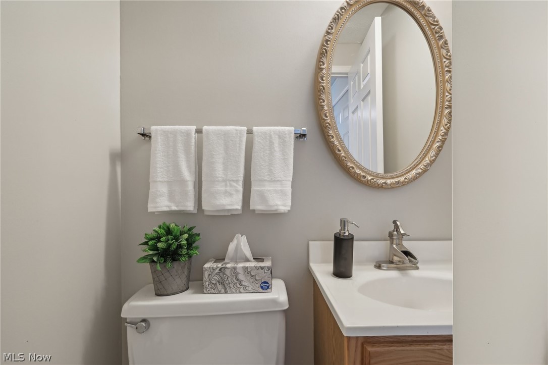 10253 Hoose Road Mentor, OH 44060 - Photo 4 of 30 Bathroom featuring vanity and toilet