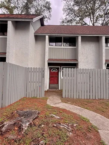 a front view of a house with a garage