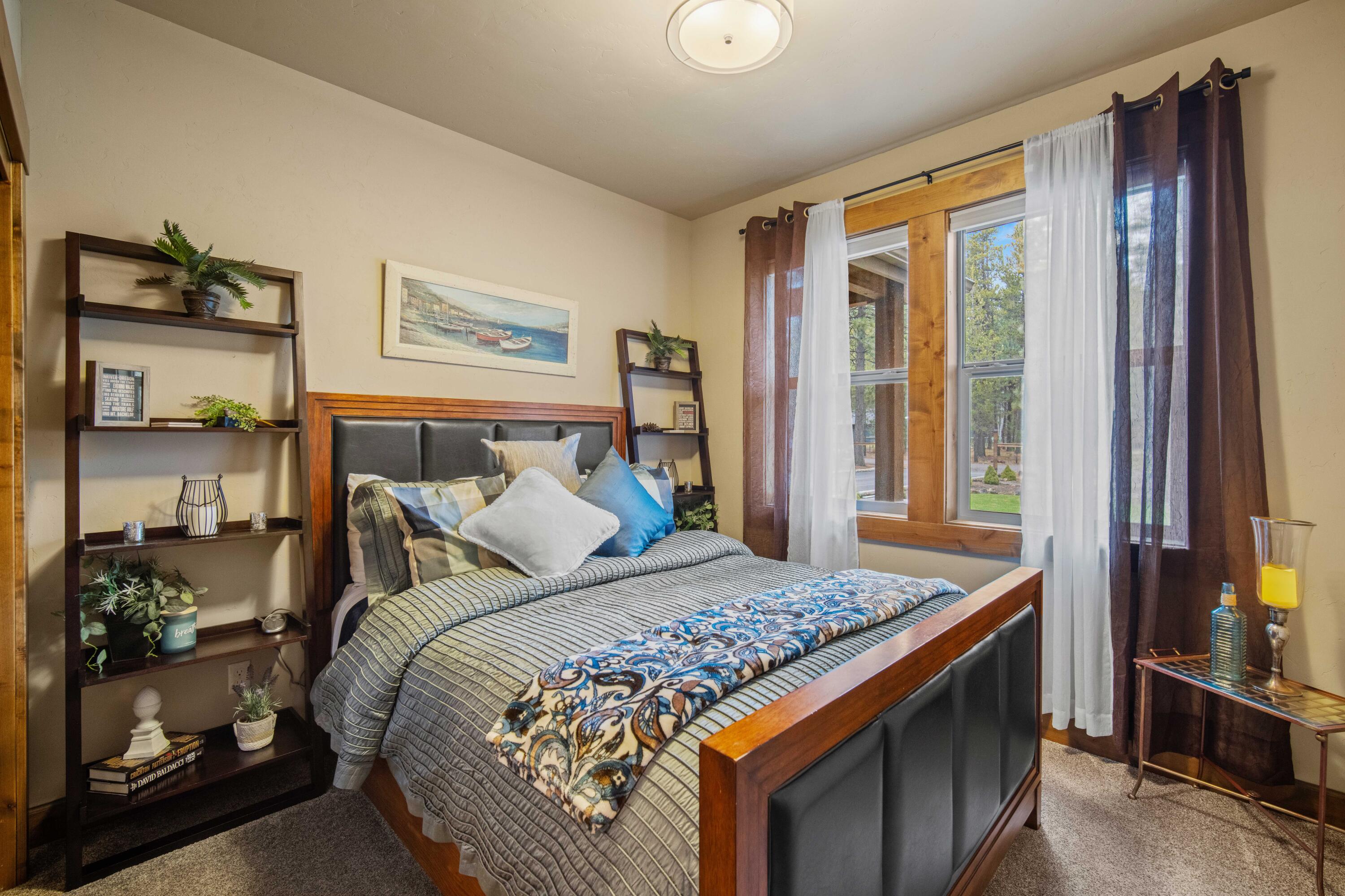 16927 Covina Road Bend, OR 97707 - Photo 21 of 54 Inviting guest bedroom in this Bend, Oregon home with warm finishes, natural light, and a comfortable layout for family or visitors.