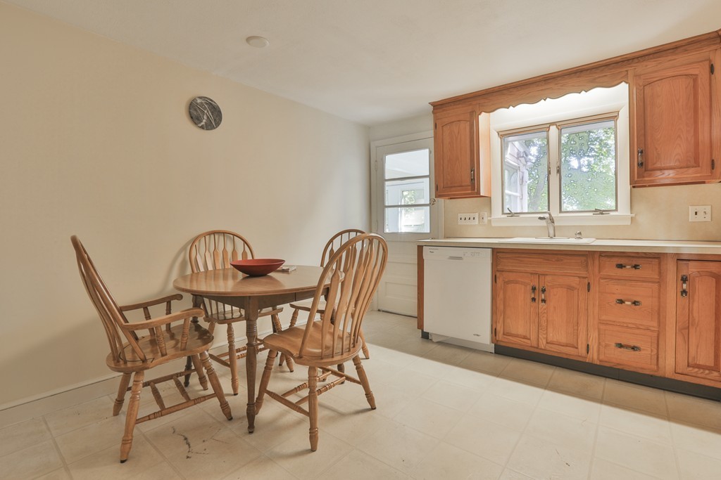 27 Gleason Road Reading, MA 01867 - Photo 15 of 28 a view of a dining room with furniture and window