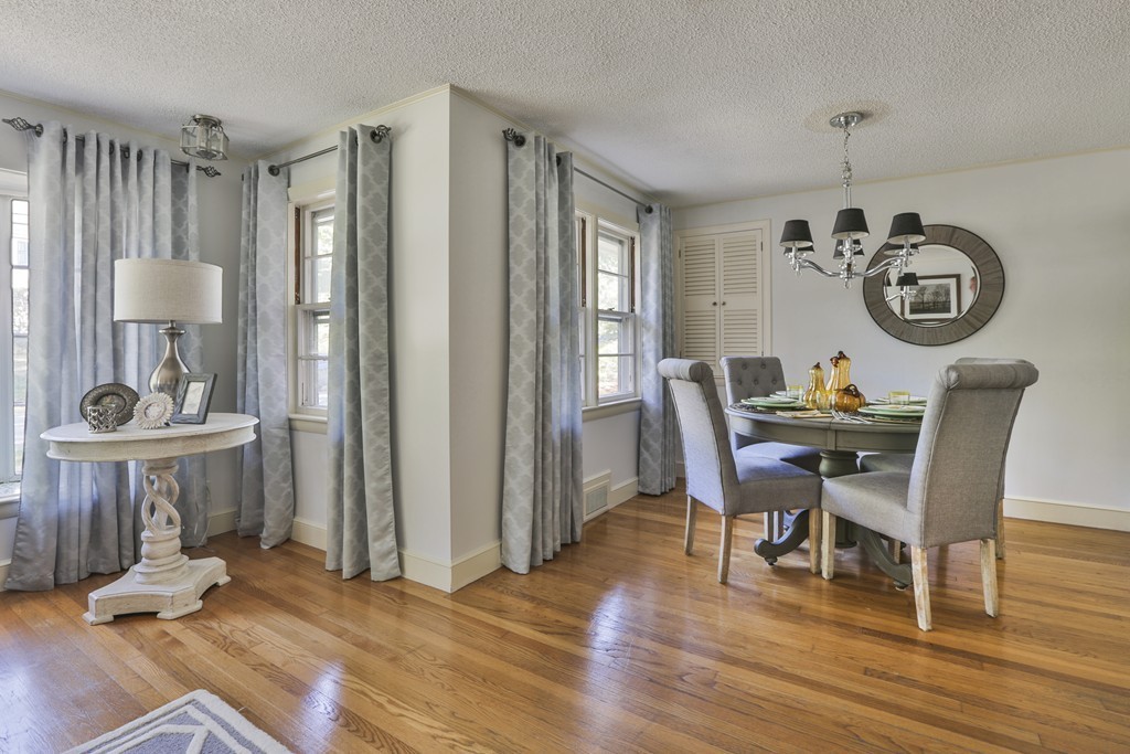 27 Gleason Road Reading, MA 01867 - Photo 4 of 28 a view of a dining room with furniture window and wooden floor
