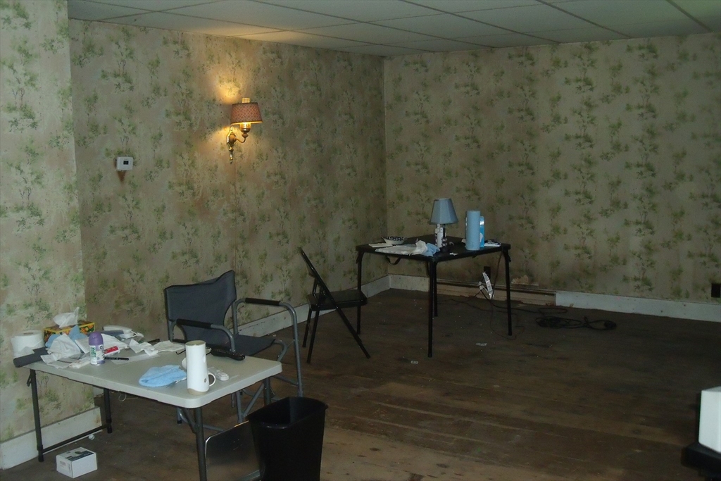 35 Goshen Road Williamsburg, MA 01096 - Photo 15 of 21 a view of a workspace with furniture and wooden floor
