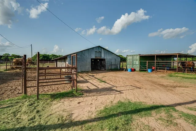 a view of a swimming pool with an outdoor space